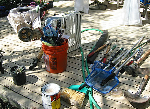 The larger tools and more junk that filled the right side of the cabinet to overflowing.